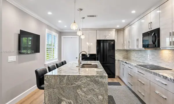 3237 Deer Creek Lake Shore Drive, Deerfield Beach, FL 33442